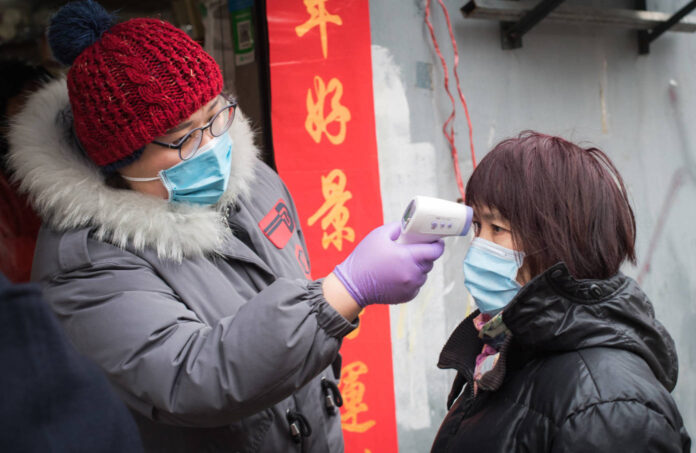 Xinhua Headlines: Wuhan combs communities to leave no coronavirus patient unattended